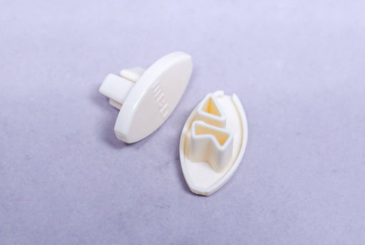 MCD BEIGE RIGHT HEM RAIL END CAP 25.311R