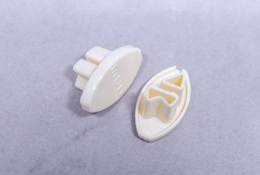 MCD BEIGE LEFT HEM RAIL END CAP 25.311L