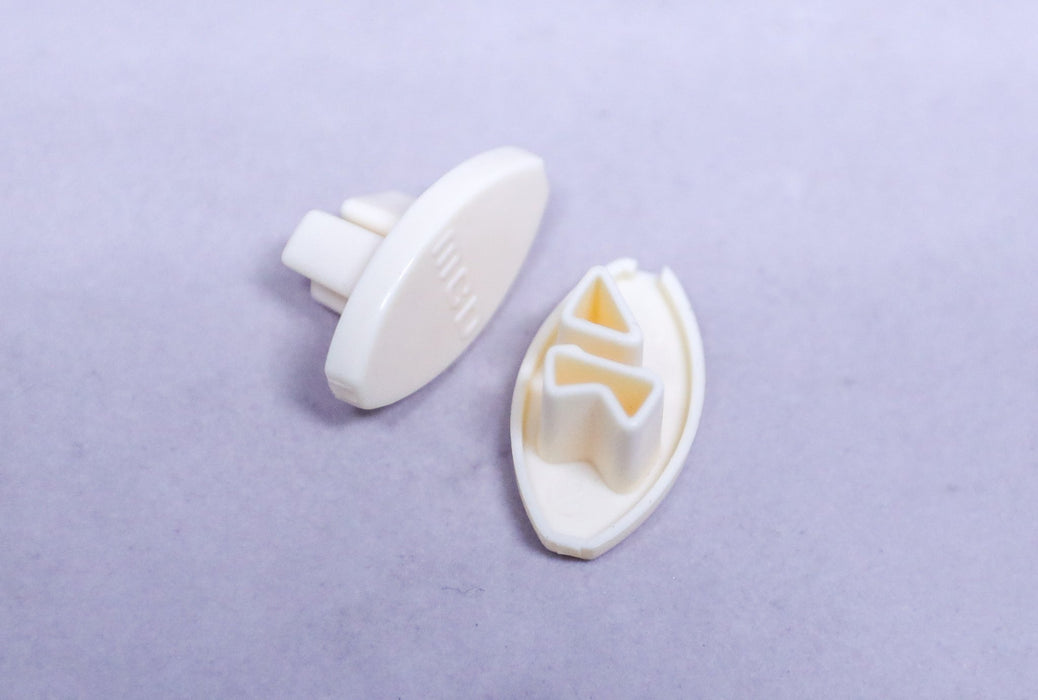 MCD BEIGE RIGHT HEM RAIL END CAP 25.311R