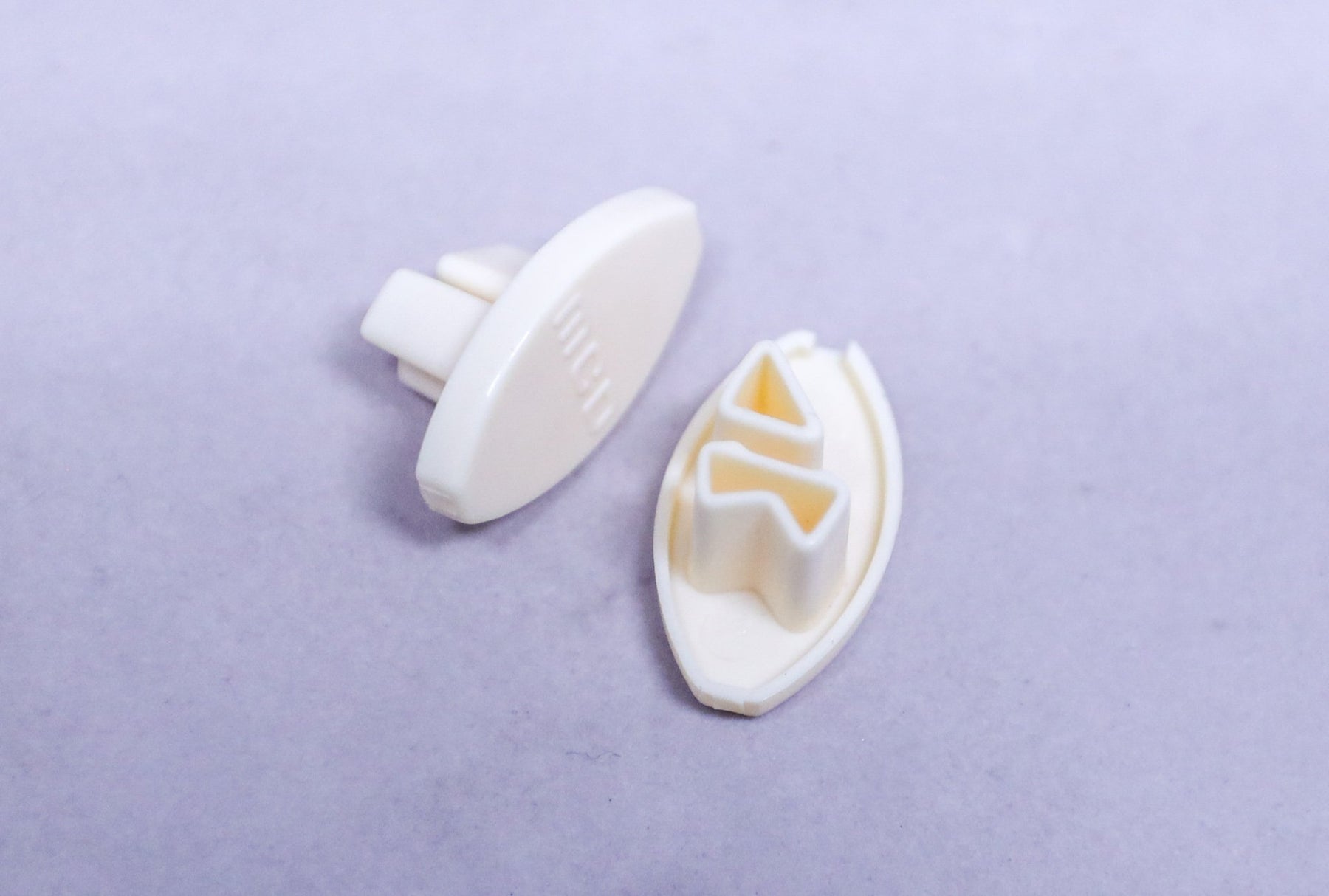 MCD BEIGE RIGHT HEM RAIL END CAP 25.311R