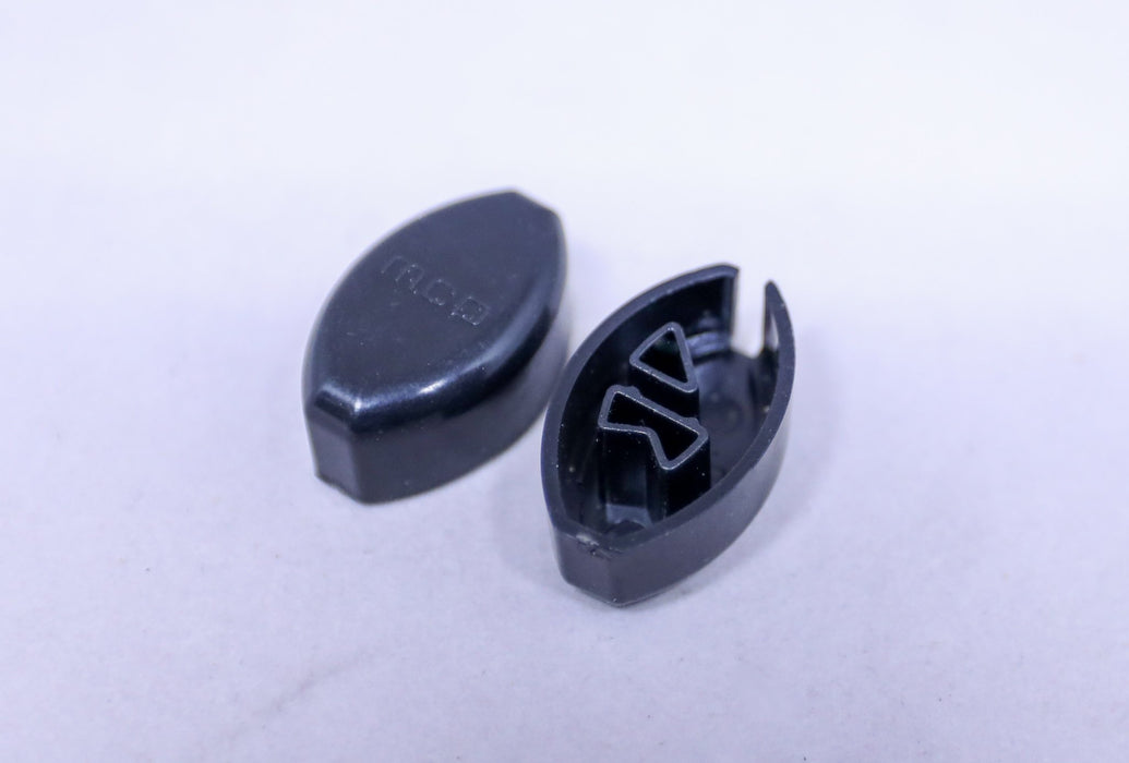 MCD LG/RT BLACK HEM RAIL END CAP 25.306R